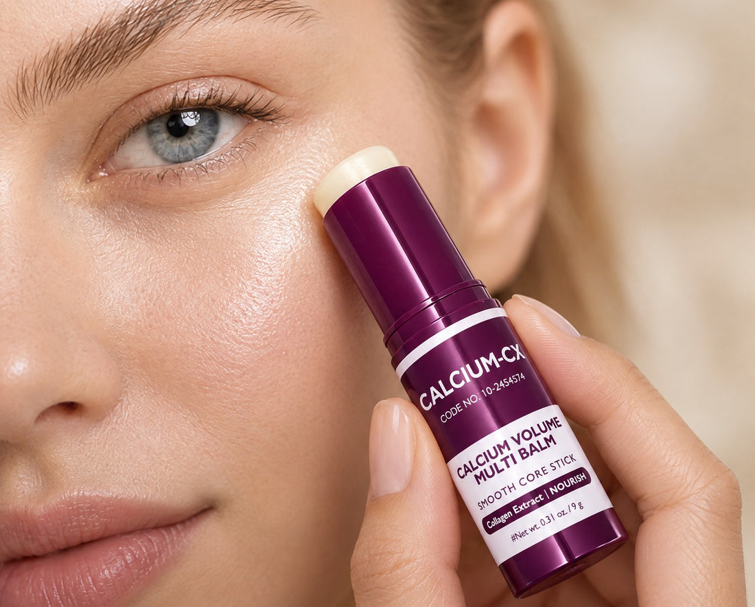 A woman gliding the CloudSense Lift Stick under her eye