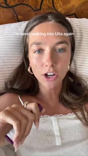 Creator applying the Lift Stick under her eyes